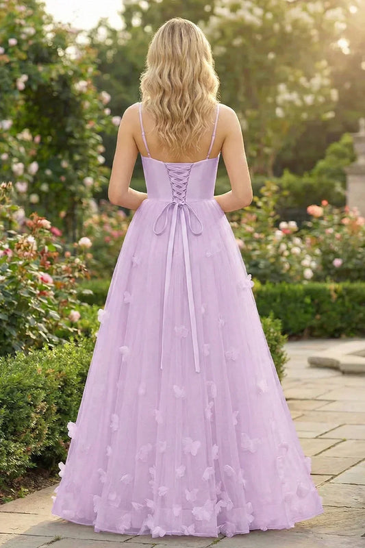 Back view of Sevoba lavender butterfly tulle evening gown showing a lace-up corset back and flowy floor-length skirt, garden background