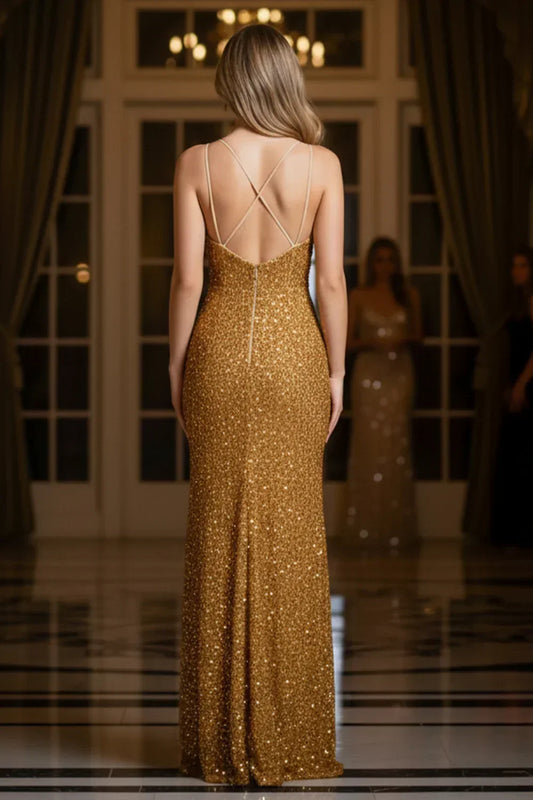 Back view of Sevoba gold sequin evening gown showing criss-cross spaghetti straps and a fitted silhouette, indoor ballroom background