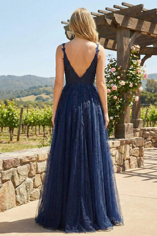 Sevoba navy blue one-shoulder a-line prom dress with sequin bodice and waist cutout, back view in ballroom setting
