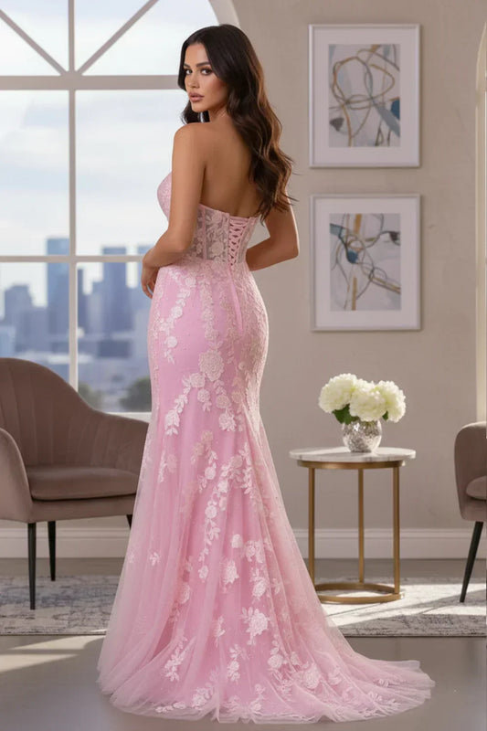 Sevoba blush pink sweetheart strapless lace mermaid prom dress with lace-up corset back and fitted silhouette, back view indoors