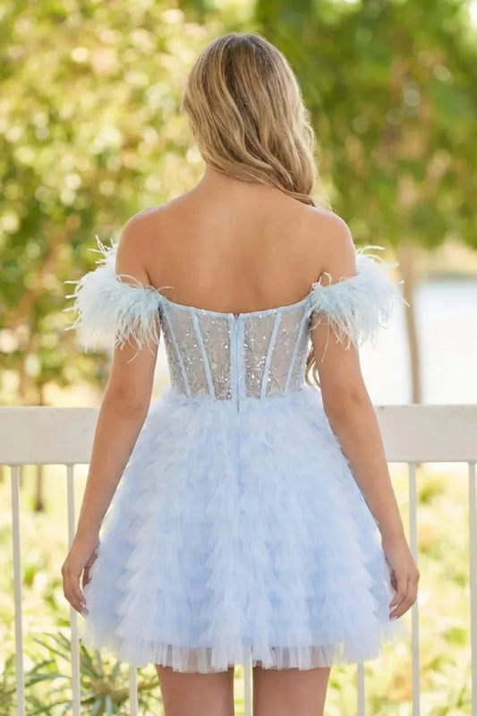 Back view of a light blue off-the-shoulder homecoming dress with feathers and sequin bodice