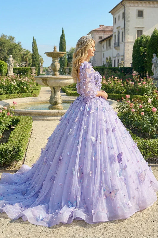 Lavender ball gown with 3D butterfly appliqués and illusion long sleeves in a garden setting