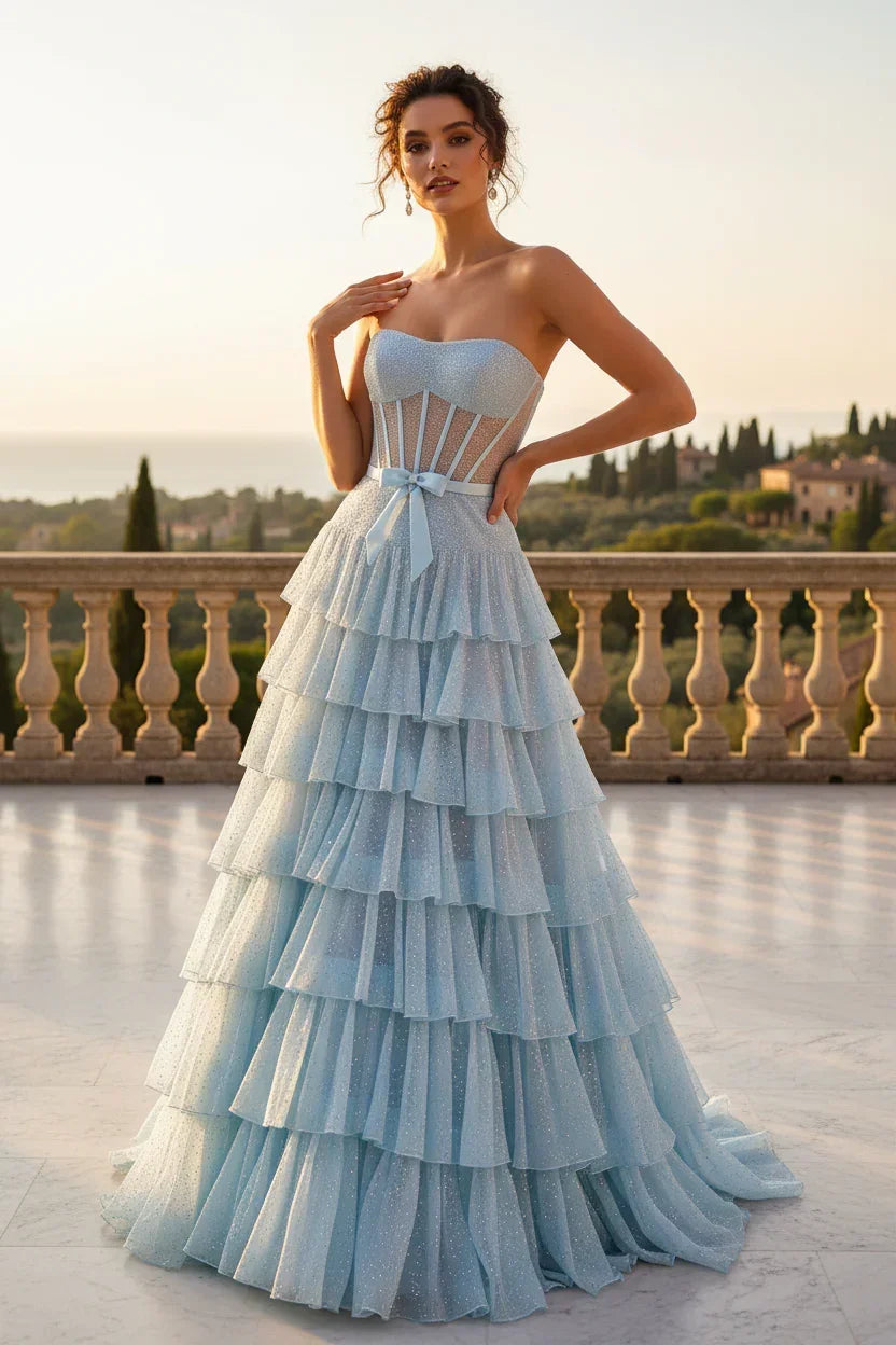 Strapless A-line light blue prom dress with beaded corset, ruffled tiers, and bow detail