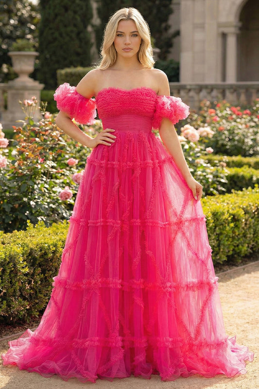 Sevoba hot pink tulle A-line prom dress featuring puffy off-the-shoulder sleeves and a ruffle-textured geometric skirt, front view in garden setting