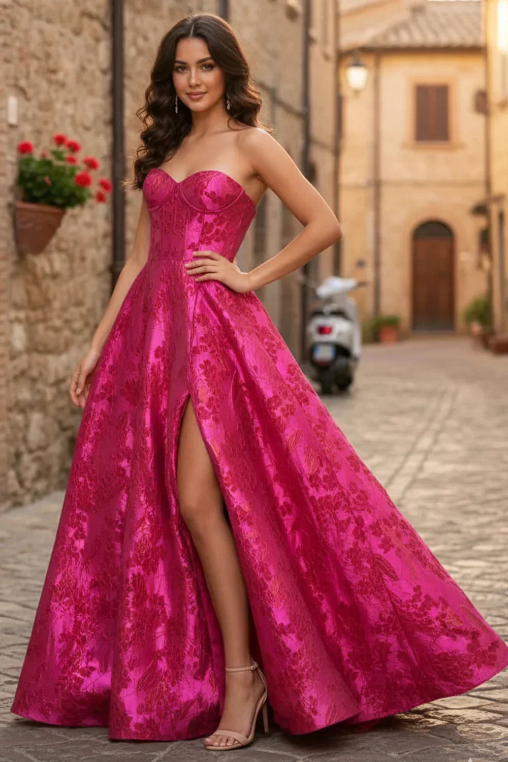 Sevoba strapless hot pink floral brocade prom dress featuring a sweetheart neckline, corset bodice, and high leg slit, front view on street