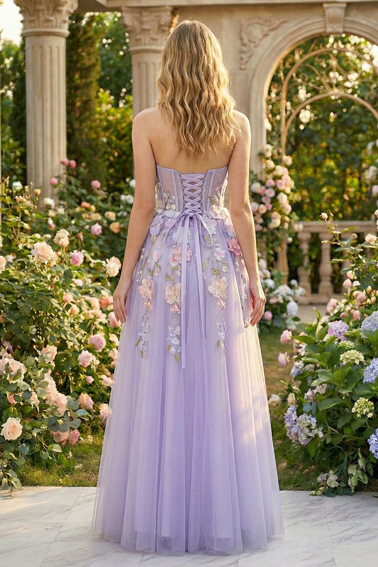 Back view of Sevoba lilac fairycore evening gown showing a lace-up corset back and floral details on tulle skirt, garden background