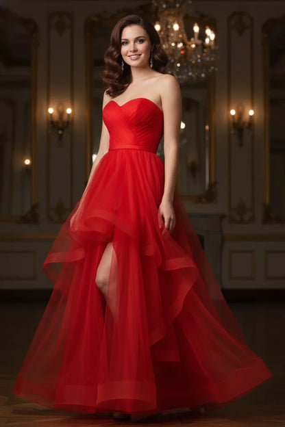 Sevoba strapless red tulle prom dress featuring a ruched sweetheart bodice, asymmetrical ruffles, and a thigh-high slit
