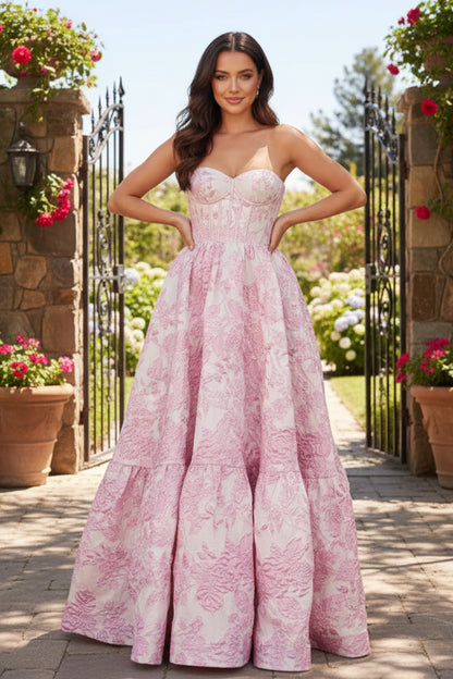 Sevoba pink strapless sweetheart corset floral ball gown prom dress, front view in garden gate setting