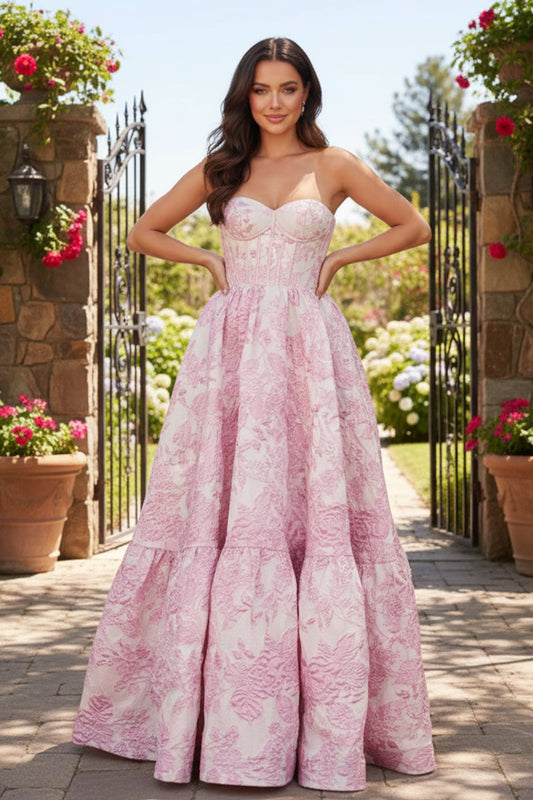 Sevoba pink strapless sweetheart corset floral ball gown prom dress, front view in garden gate setting