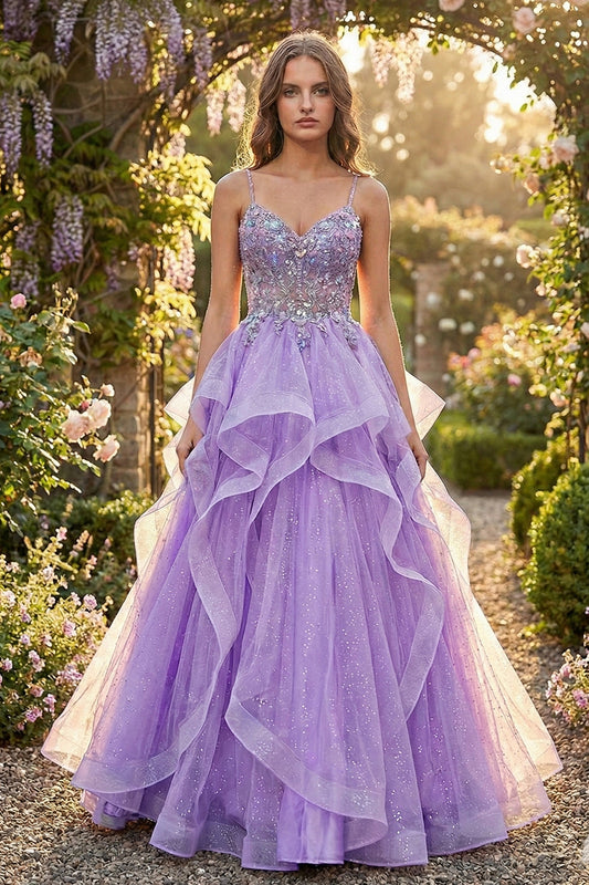 Sevoba lilac glitter tulle ball gown prom dress featuring a crystal beaded corset bodice and voluminous tiered ruffle skirt, front view in garden setting