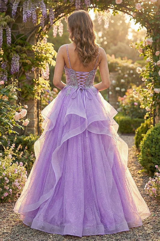 Back view of Sevoba purple sparkle ruffled prom dress showing a lace-up corset back and cascading glitter tulle skirt, garden archway background