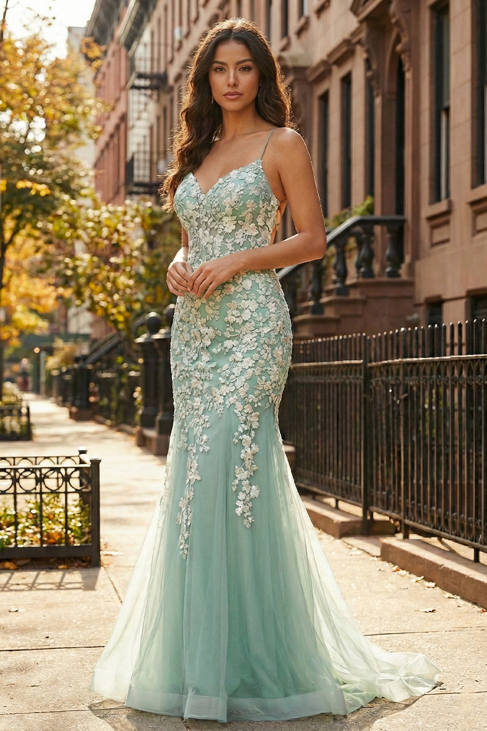 Sevoba Spaghetti Strap Mint Green Floral Lace Mermaid Prom Dress. Front view on street.
