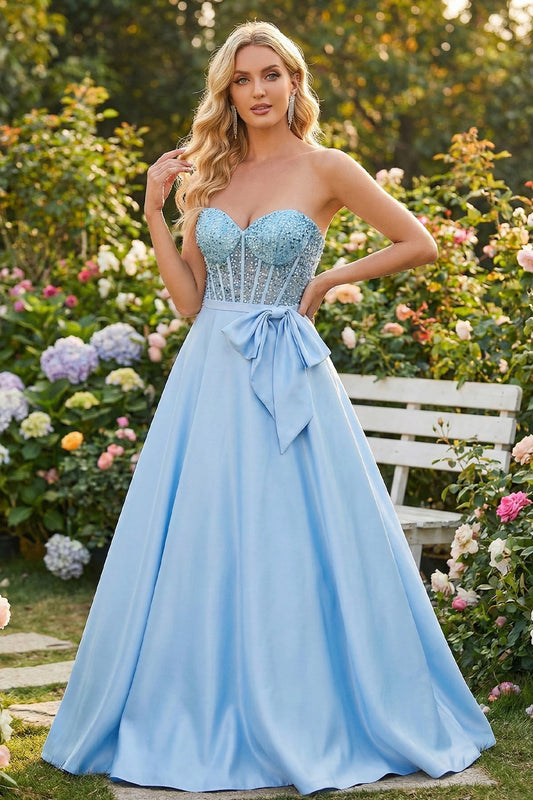 Sevoba light blue strapless sweetheart beaded corset satin A-line prom dress with bow, front view in garden setting