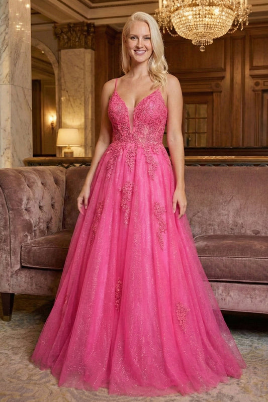 Sevoba hot pink glitter tulle A-line prom dress featuring a floral lace corset bodice and V-neckline, front view in hotel lobby setting