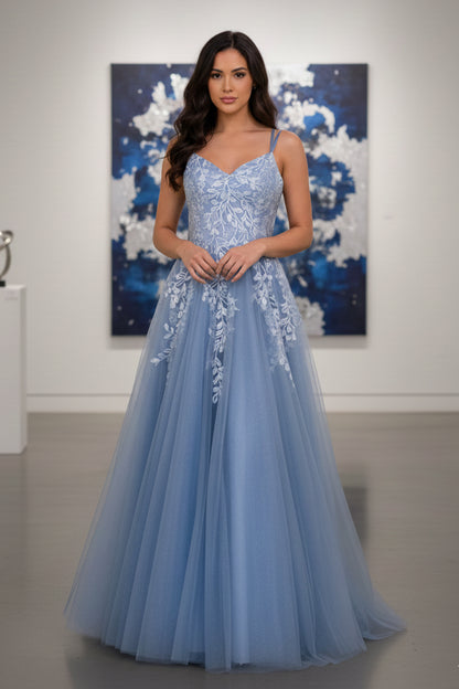 Sevoba dusty blue glitter tulle A-line prom dress featuring white leaf lace appliqués and double spaghetti straps, front view in art gallery setting