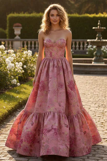 A-line strapless long pink prom dress with floral and butterfly patterns, outdoor setting