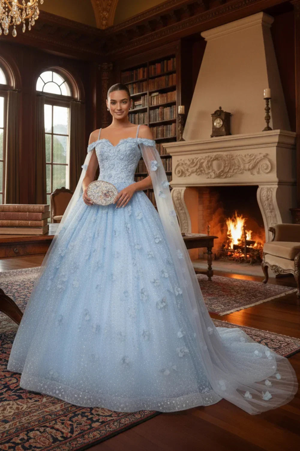 Woman in blue off-the-shoulder ball gown with 3D floral details, standing in elegant library